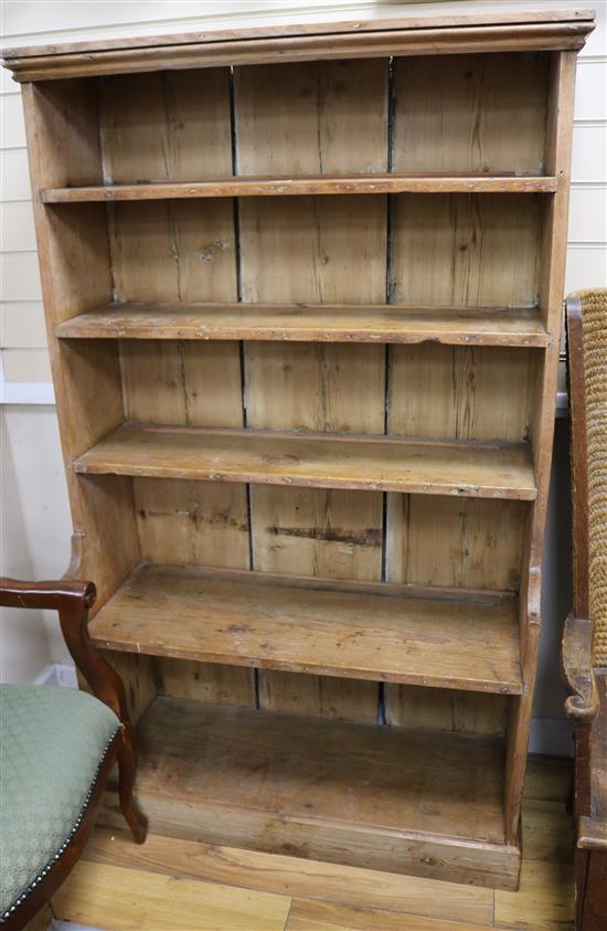 An antique pine waterfall bookcase W.87cm